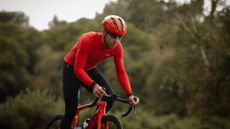 Male cyclist wearing one of the best long sleeve jerseys for cycling